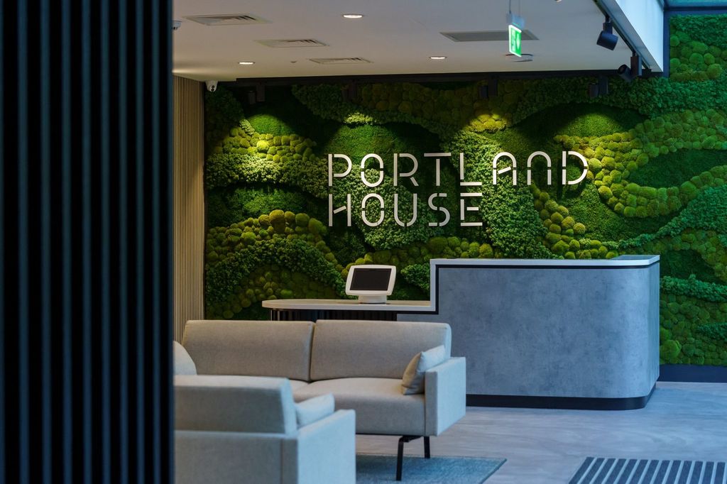 Portland House reception with its moss wall